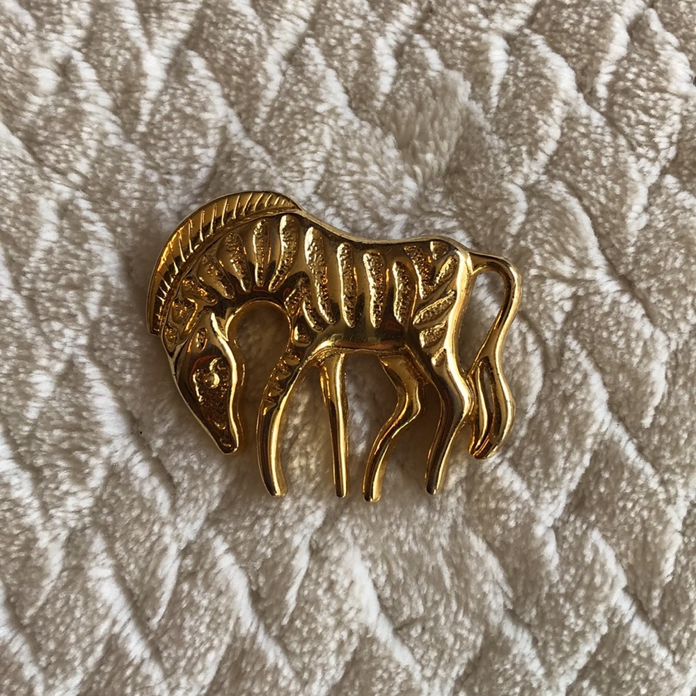 Retro gold tone zebra brooch